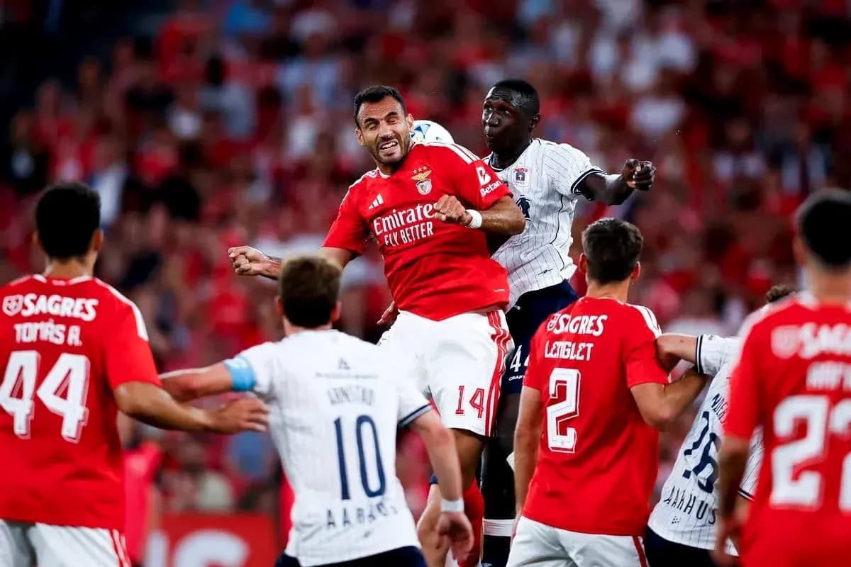 Players contesting a header during Aarhus vs Benfica Players contesting a header during Aarhus vs Benfica