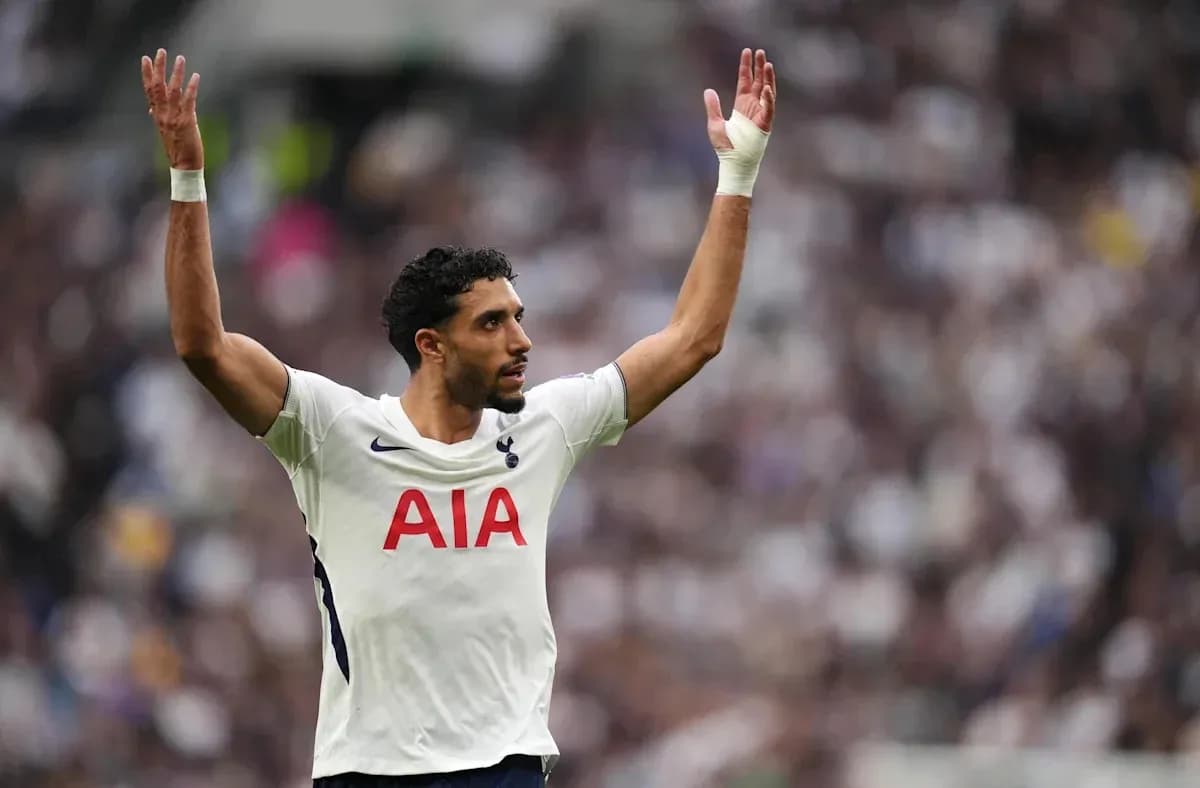 Player signaling during a match for Tottenham Hotspur Player signaling during a match for Tottenham Hotspur