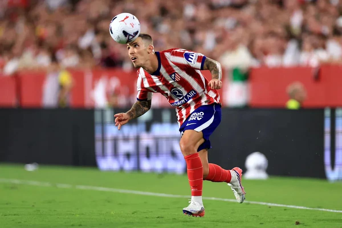 Player heading the ball during a match Player heading the ball during a match
