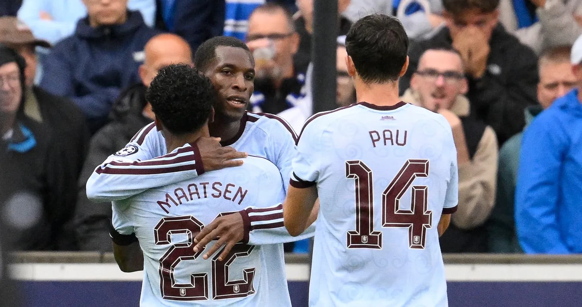 Players celebrating a goal during a match Players celebrating a goal during a match