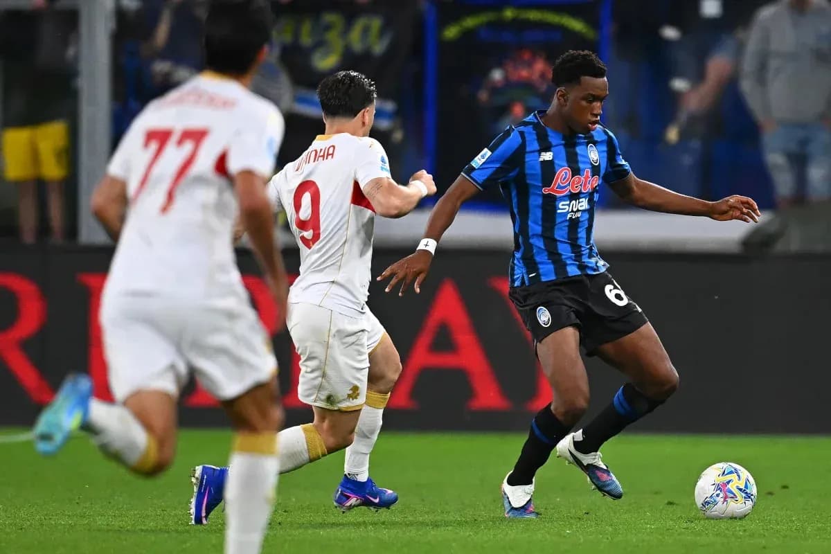 Player dribbling past opponent during match action Player dribbling past opponent during match action