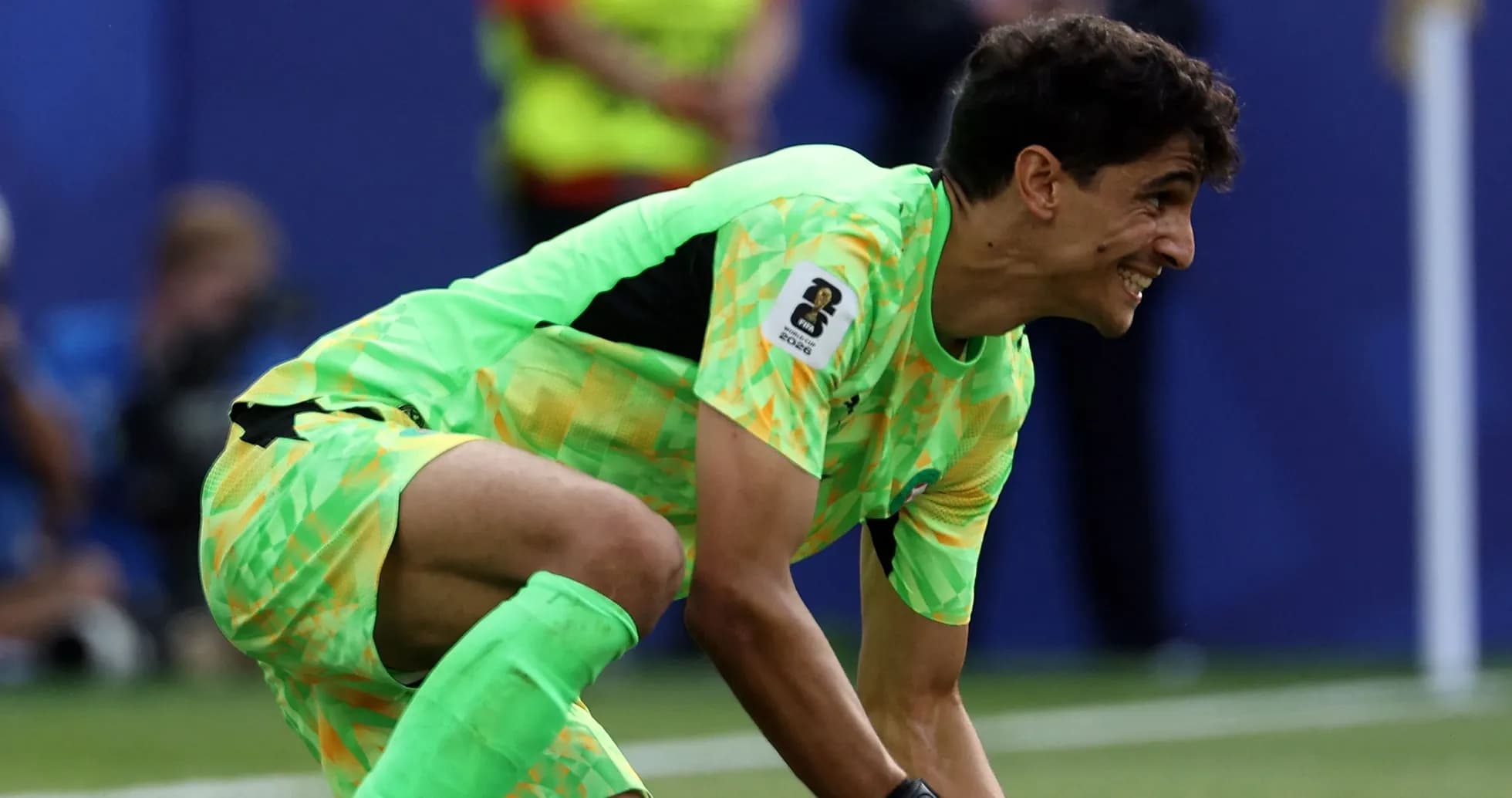 Goalkeeper in bright uniform preparing to play Goalkeeper in bright uniform preparing to play